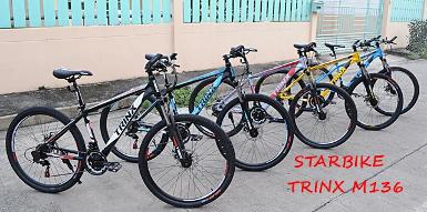 รุ่นขายดี MTB TRINX M136 กลับมาฮิตพร้อมสีสันสดใส เฟรมอลูมิเนียม เกียร์21สปีด แกนปลดหน้า